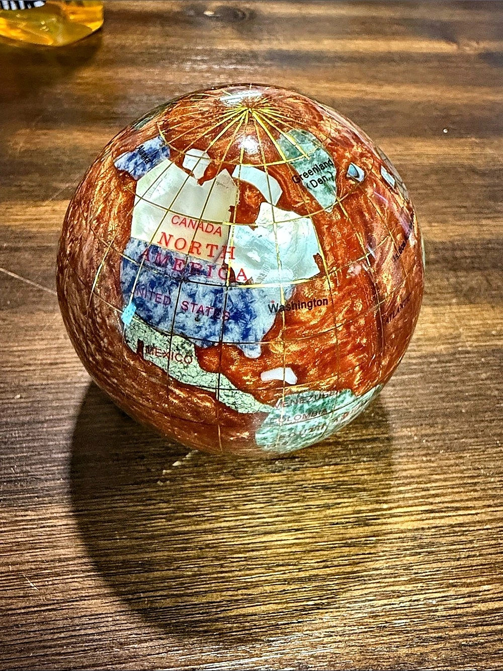Decorative gemstone world globe paperweight